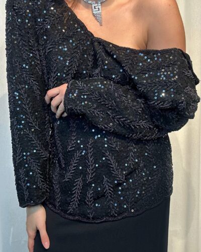 Heavily sequined blouse