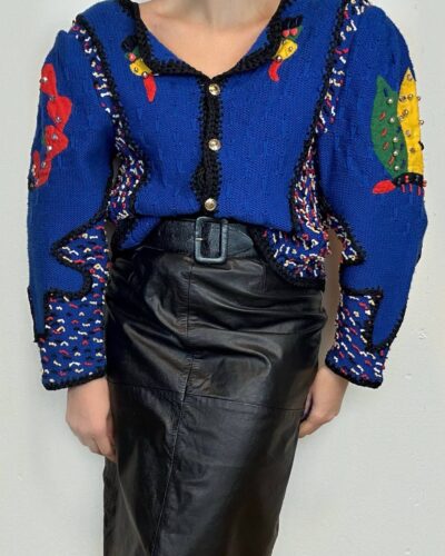 Unique hand-knitted cardigan with abstract embroidery