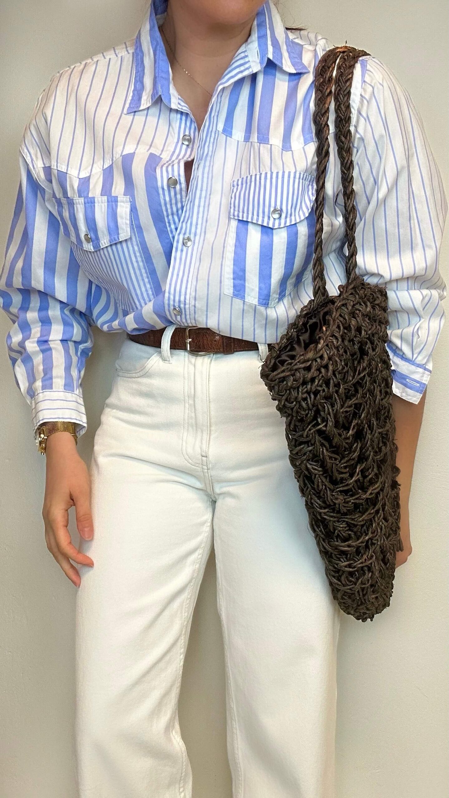 Striped shirt with pearl buttons