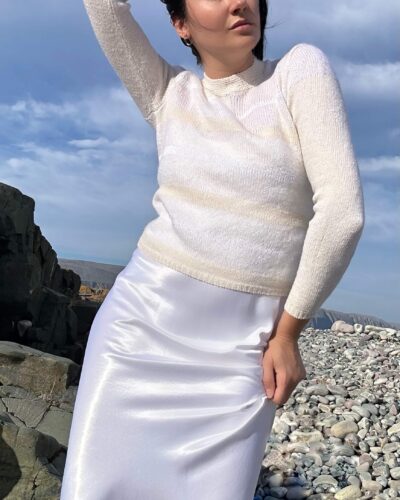 Creamy white hand-knitted striped sweater