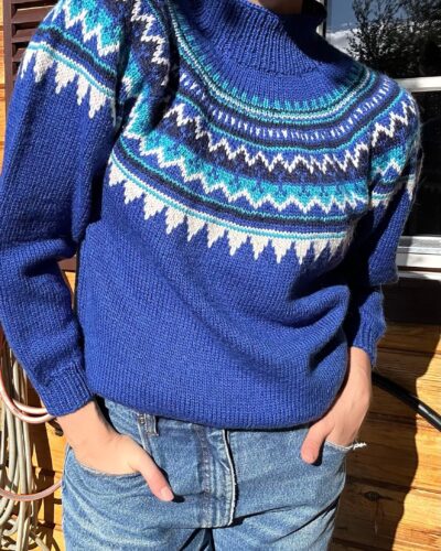 Hand-knitted azure blue woolen sweater