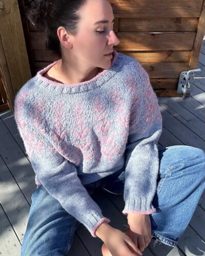 Pastel blue hand-knitted patterned sweater