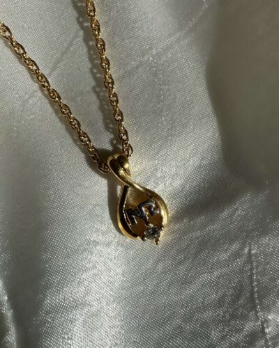 Nina Ricci harp-like ornate frame necklace