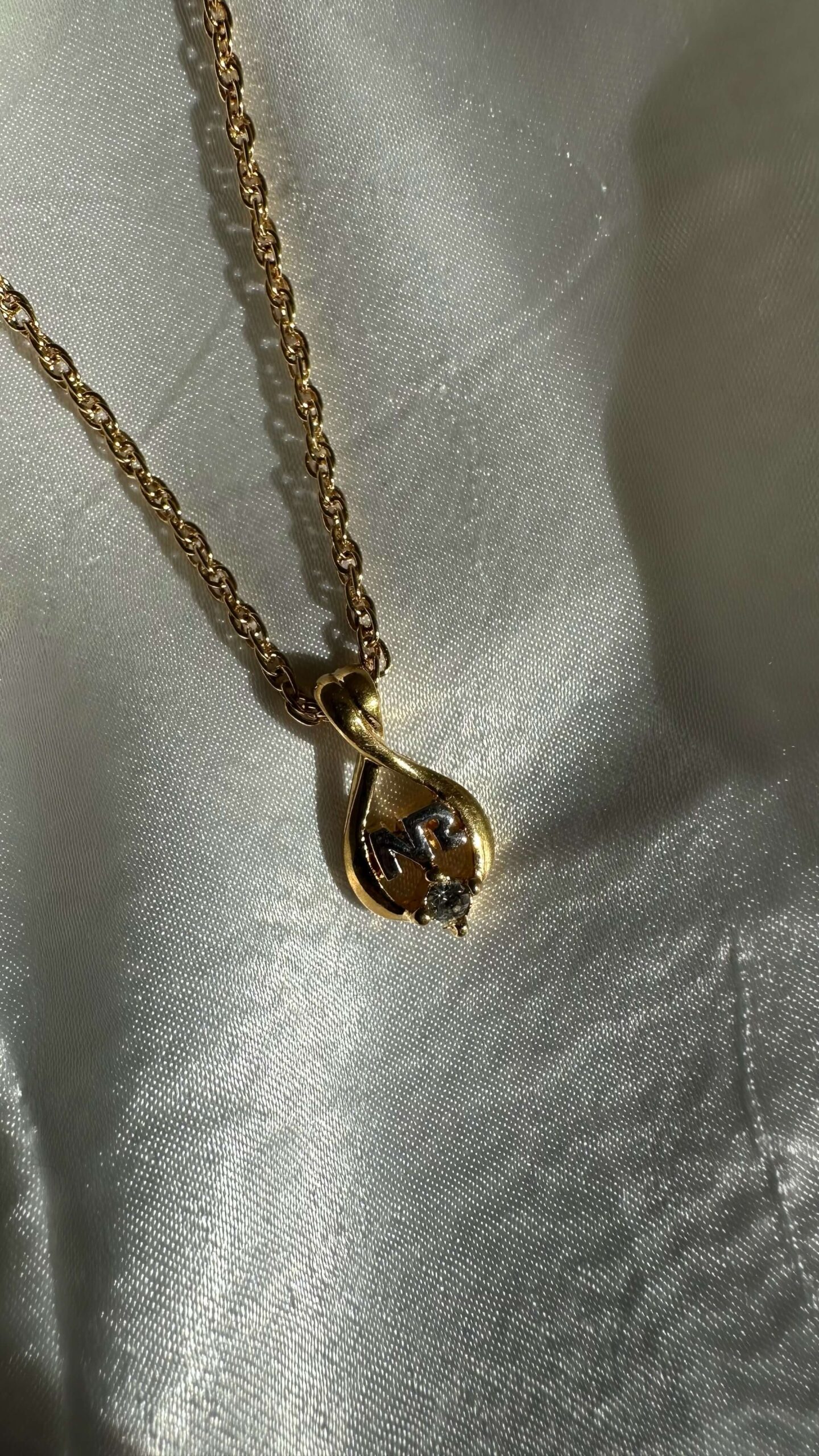 Nina Ricci harp-like ornate frame necklace