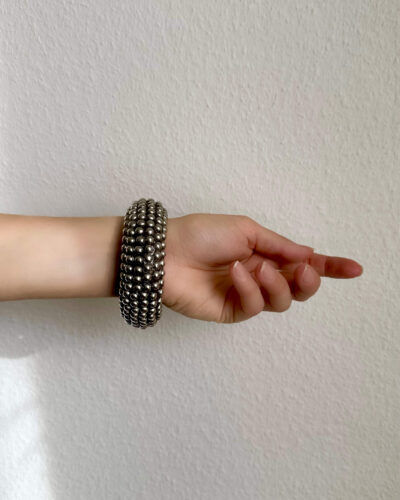 Wooden bangle with metallic bubbles