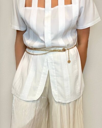 White blouse with a decollete cut