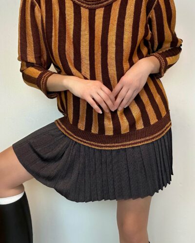 Striped hand-knitted sweater with a boat neck