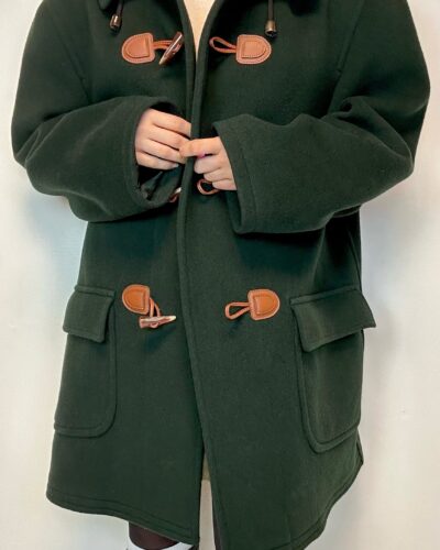 Green woolen winter duffle coat with bold shoulders