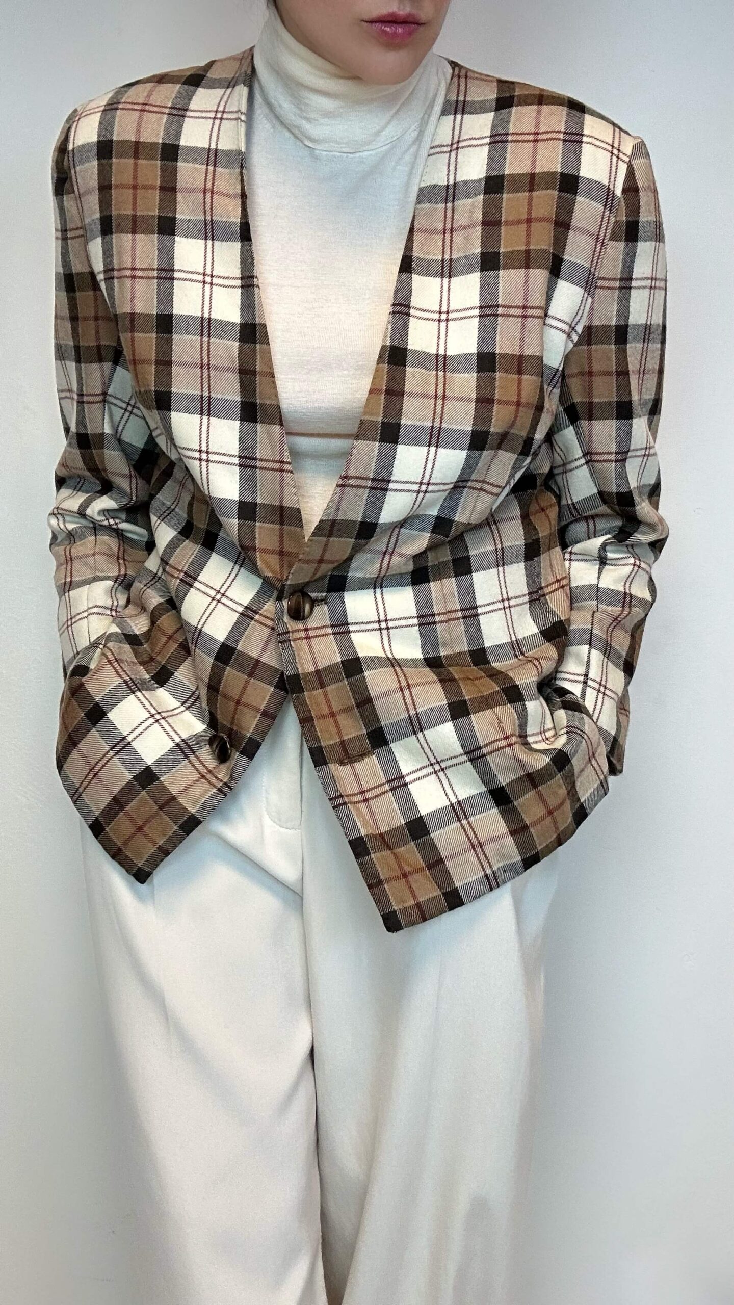 Tartan woolen jacket with a deep v-neck