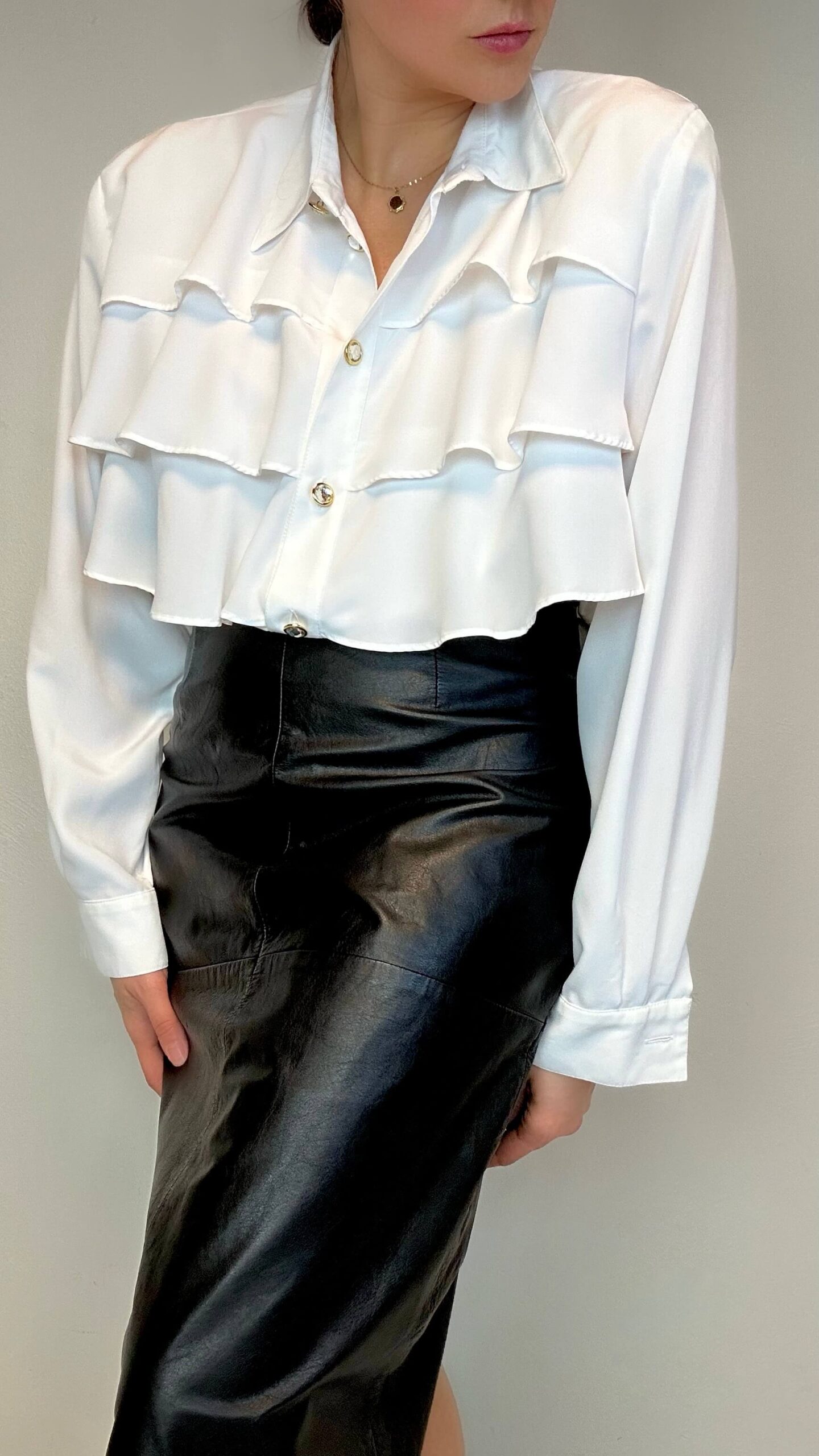 Ruffle cascade blouse with cristal buttons