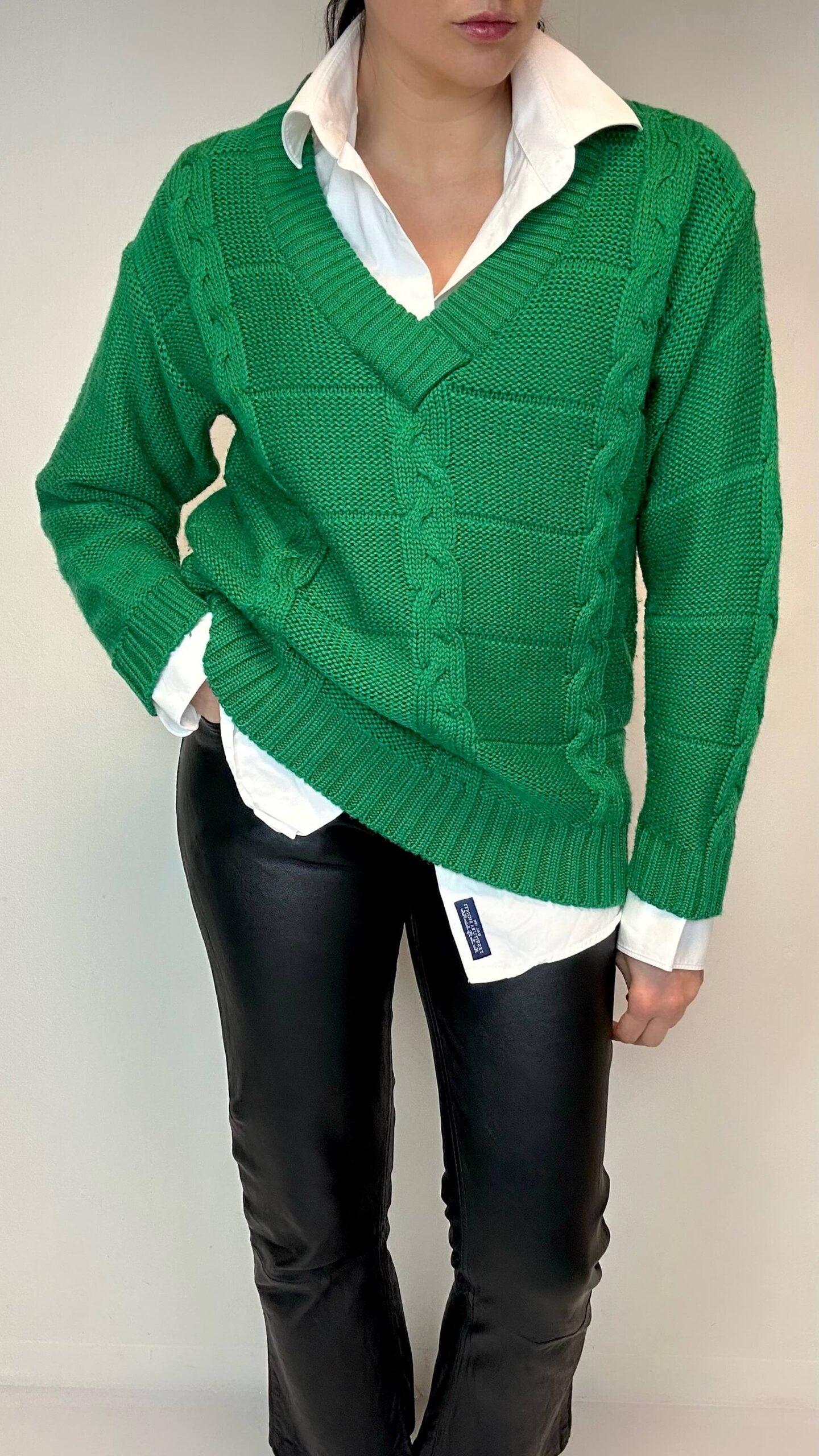 Green woolen deep v-neck cut sweater