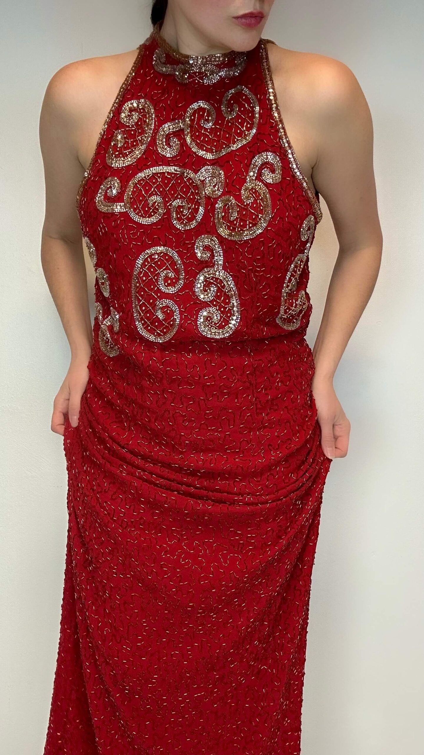Red high neck evening heavily beaded gown