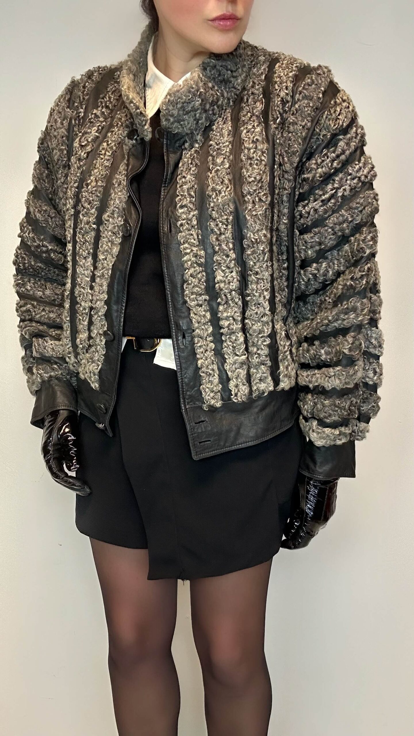 Striped baggy leather jacket with persian fur