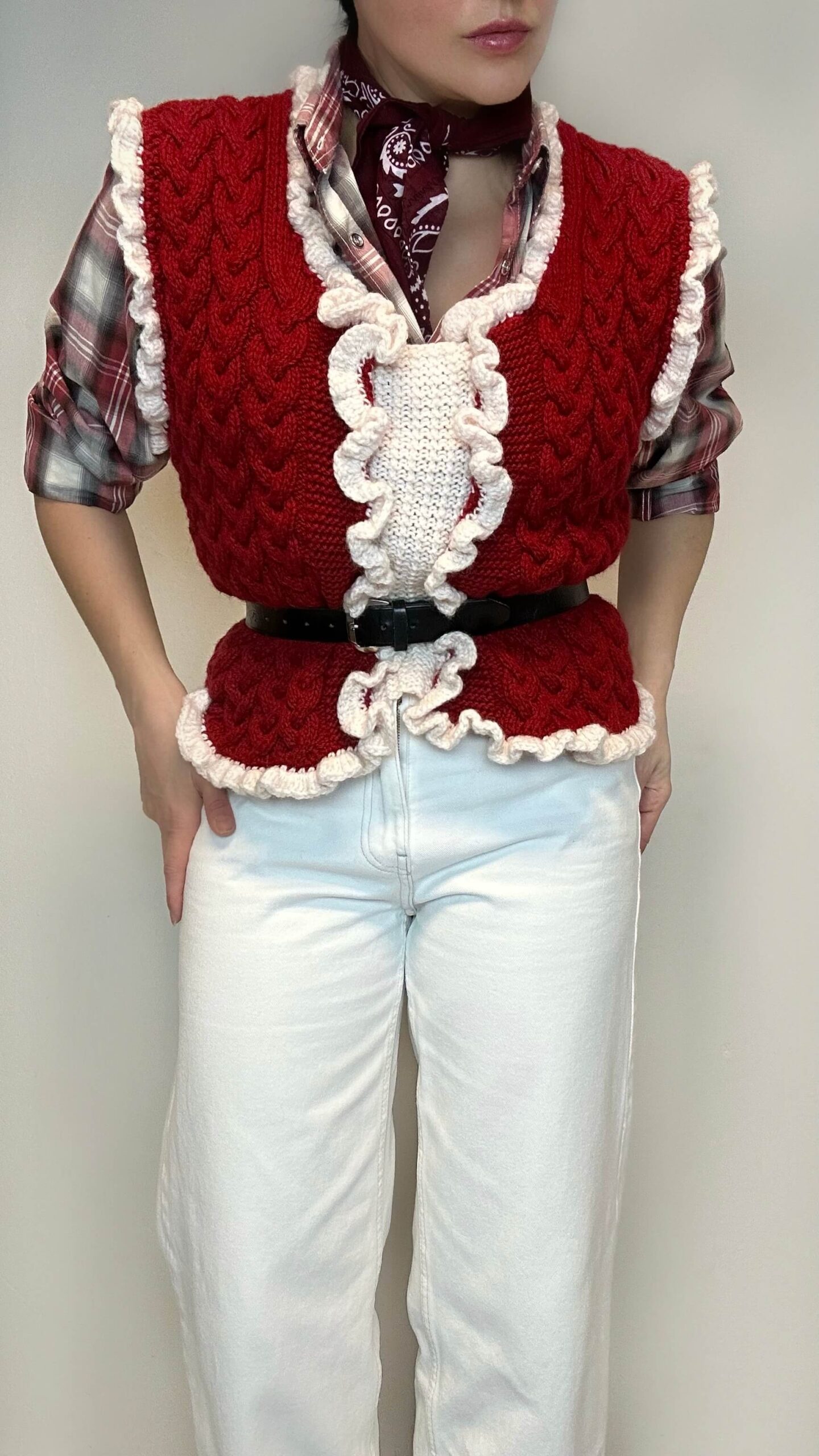 Hand-knitted wool vest with ruffle details