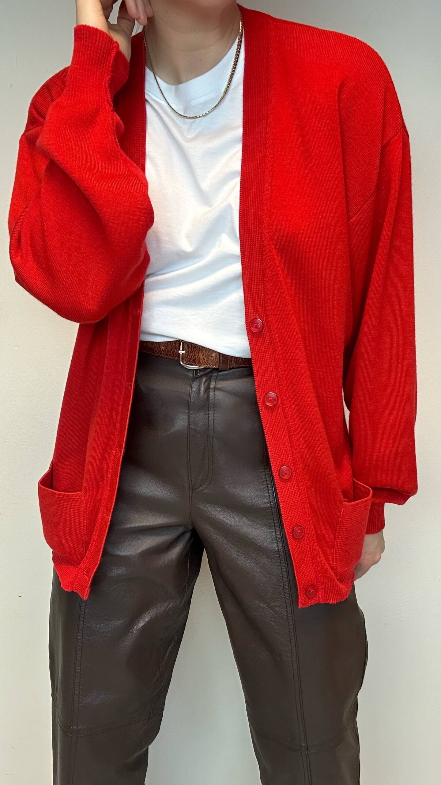 Library girl. Candy red woolen cardigan