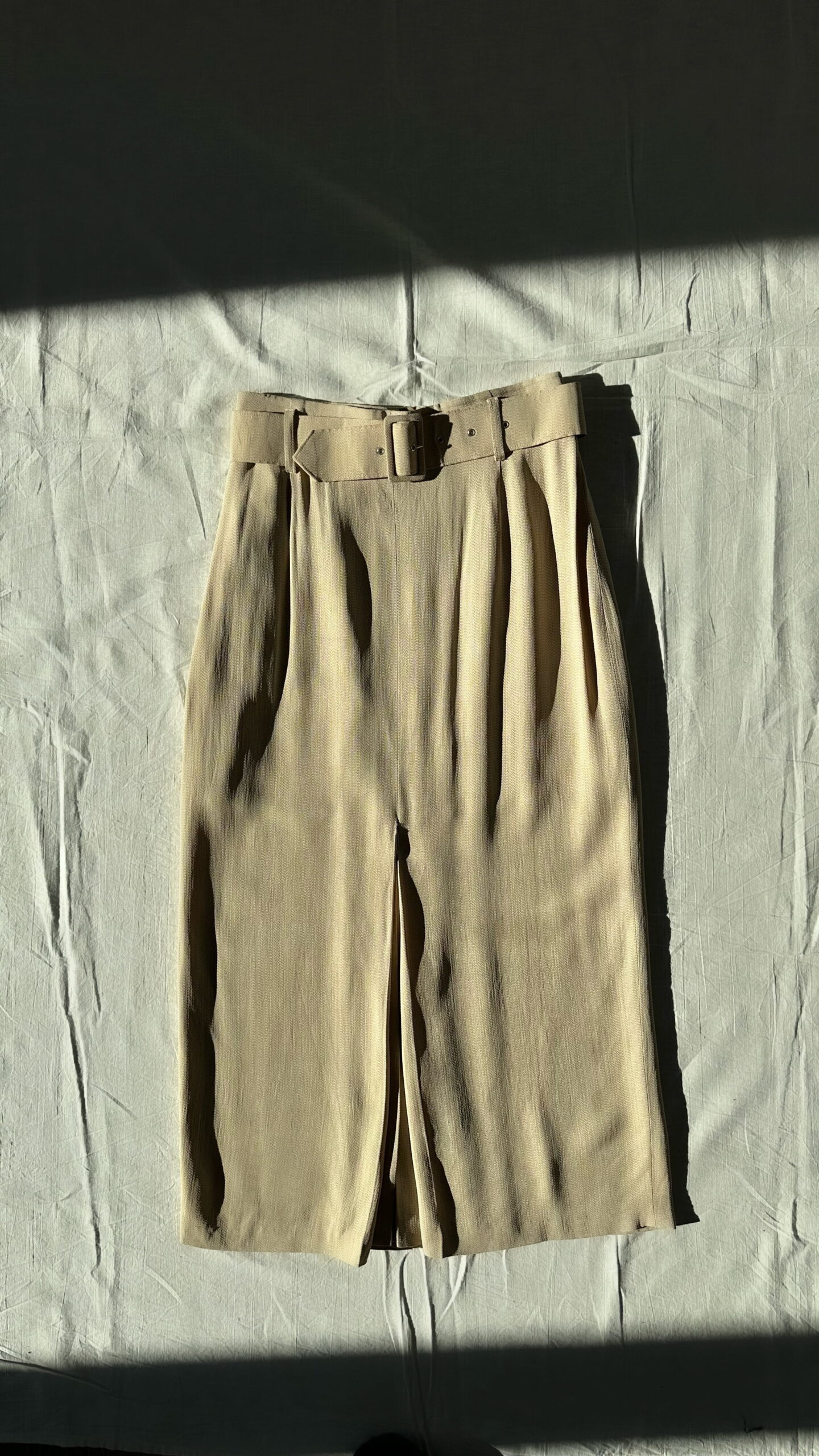 Office beige midi skirt with a wide belt